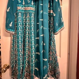 Fully embroidered and Beautiful dress with matching scarf.